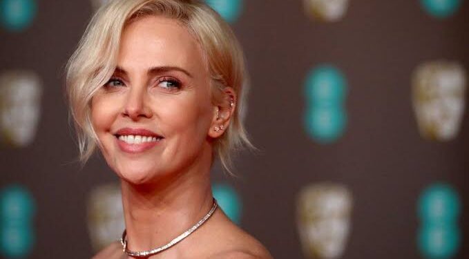 Charlize Theron admits she had trouble embracing her bombshell role.