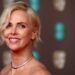 Charlize Theron admits she had trouble embracing her bombshell role.