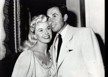 Cheers to your anniversary!—Martin Melcher & Doris Day.