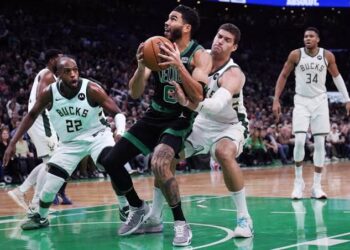Tatum overcomes sickness, aids Celtics in slowing Giannis, and…
