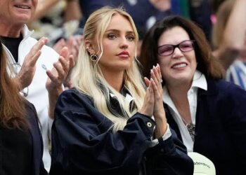 Morgan Riddle, Taylor Fritz’s gorgeous girlfriend, observes as the American player faces Alexander Zverev following their Wimbledon altercation.