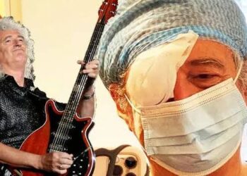 Brian May provides an update on his surgery from the hospital, Queen.
