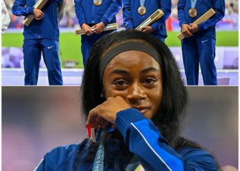 SHA ‘CARRI WAS EMOTIONAL ON THE PODIUM AFTER WINNING HER FIRST OLYMPIC GOLD   HER OLYMPIC REDEMPTION TOUR IS….