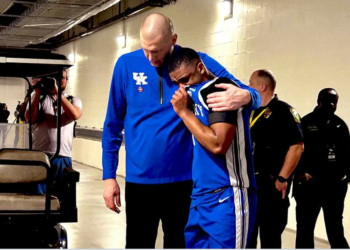 Mark Pope Consoles Lamont Bulter  Outside Locker Room following NCAA Tournament loss