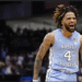 “RJ Davis Outduels Caleb Love as Team One Defeats Team Four in G League Elite Camp Clash”